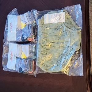 Bundle of 2packs of 12-24 month socks 6 pairs per pack 1 2pack of diaper covers.